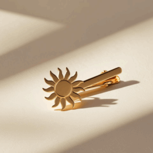 Pince à cravate soleil or jaune 18 carats – motif stylisé